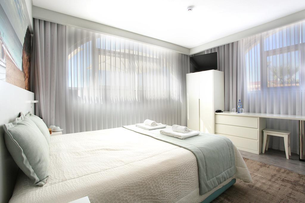 Golden Beach Guest House & Rooftop Bar فارو المظهر الخارجي الصورة